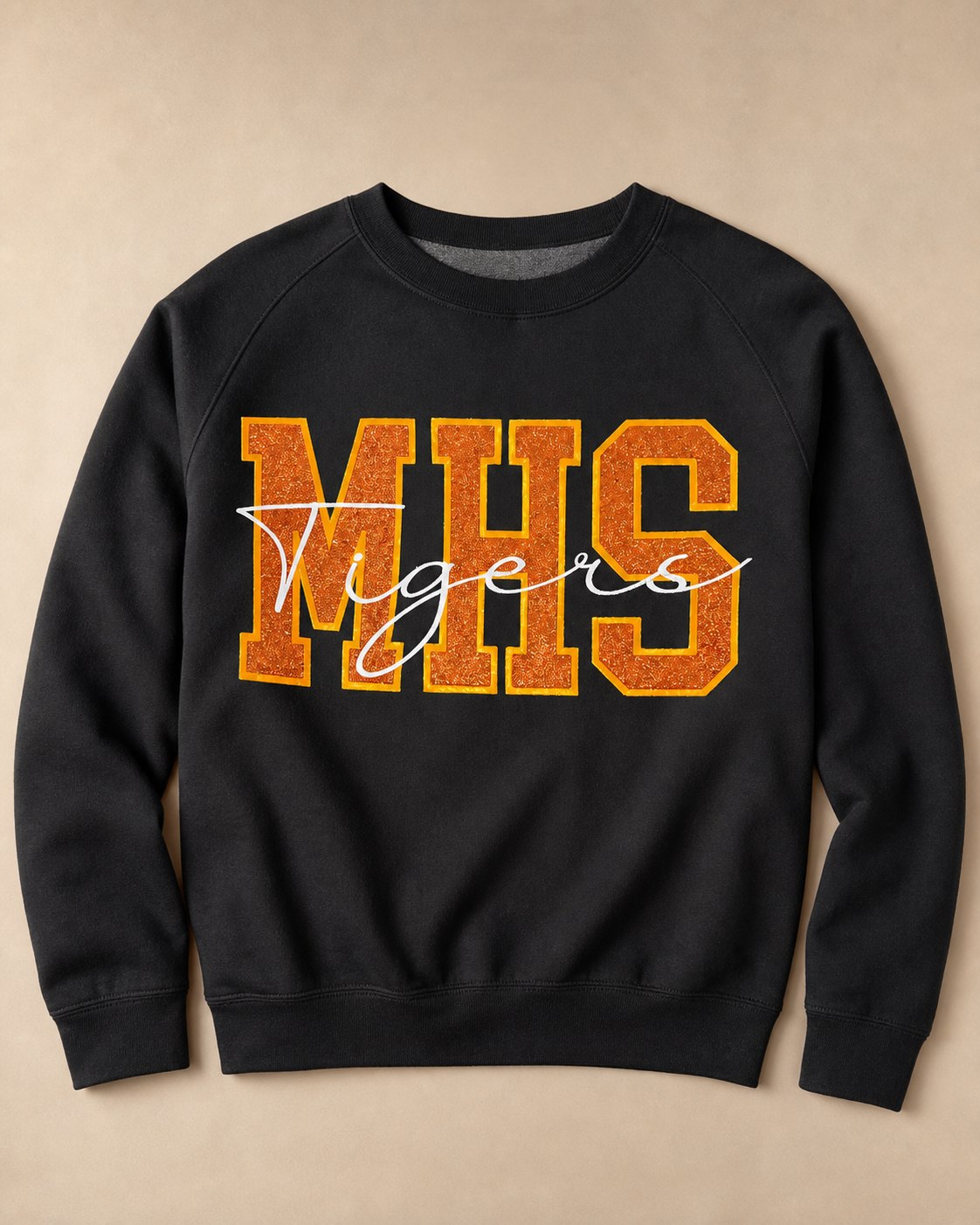 Black spirit sweatshirt with orange MHS vinyl fabric appliqué and white Tigers script.